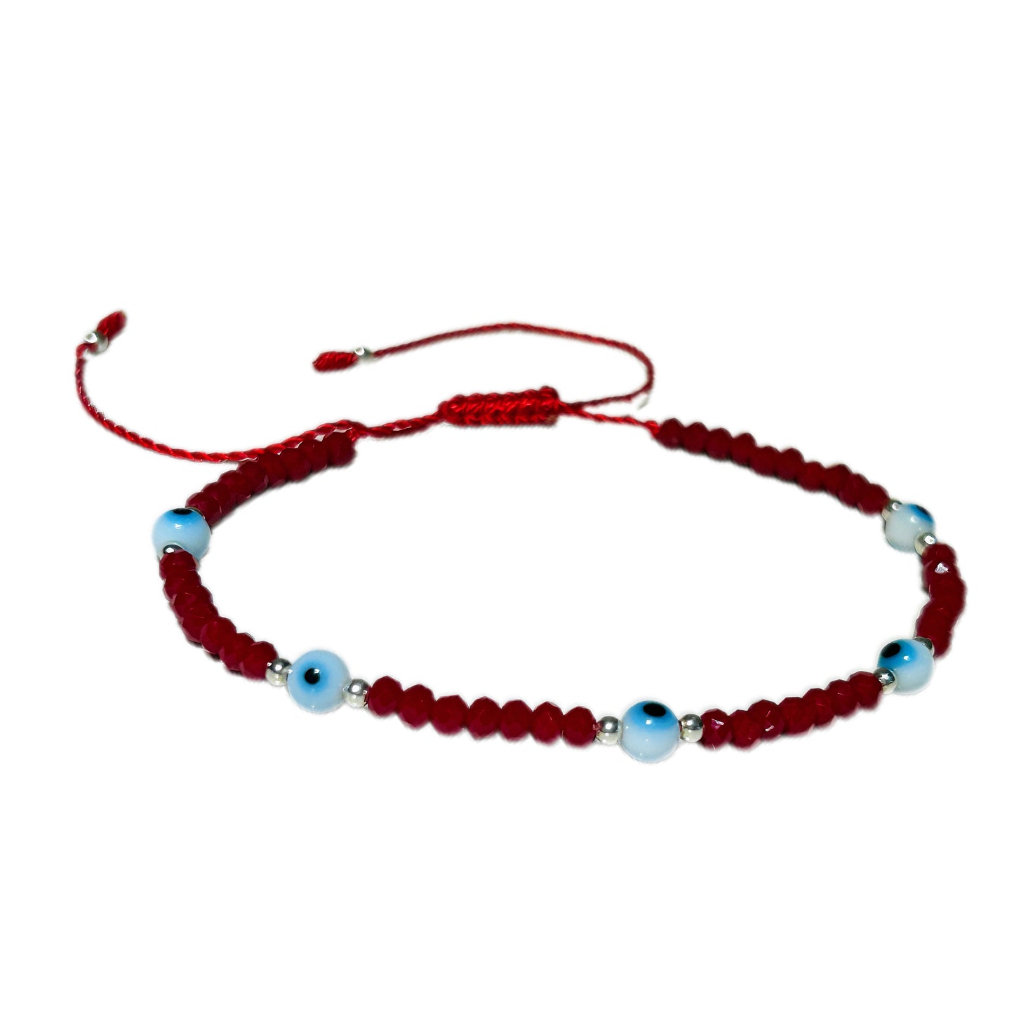 Pulsera de ojitos blancos y plata